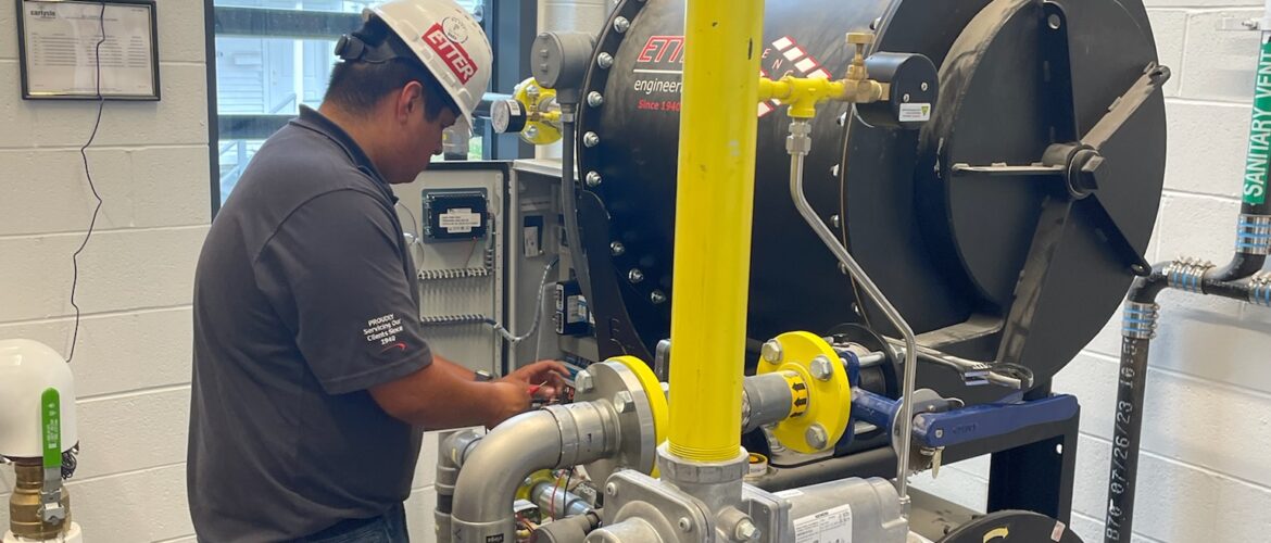 Gabe working on ETTER Booster system