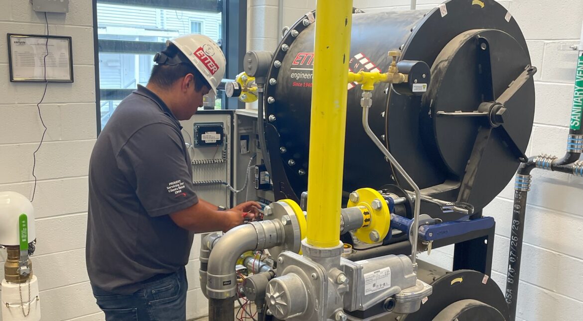 Gabe working on ETTER Booster system