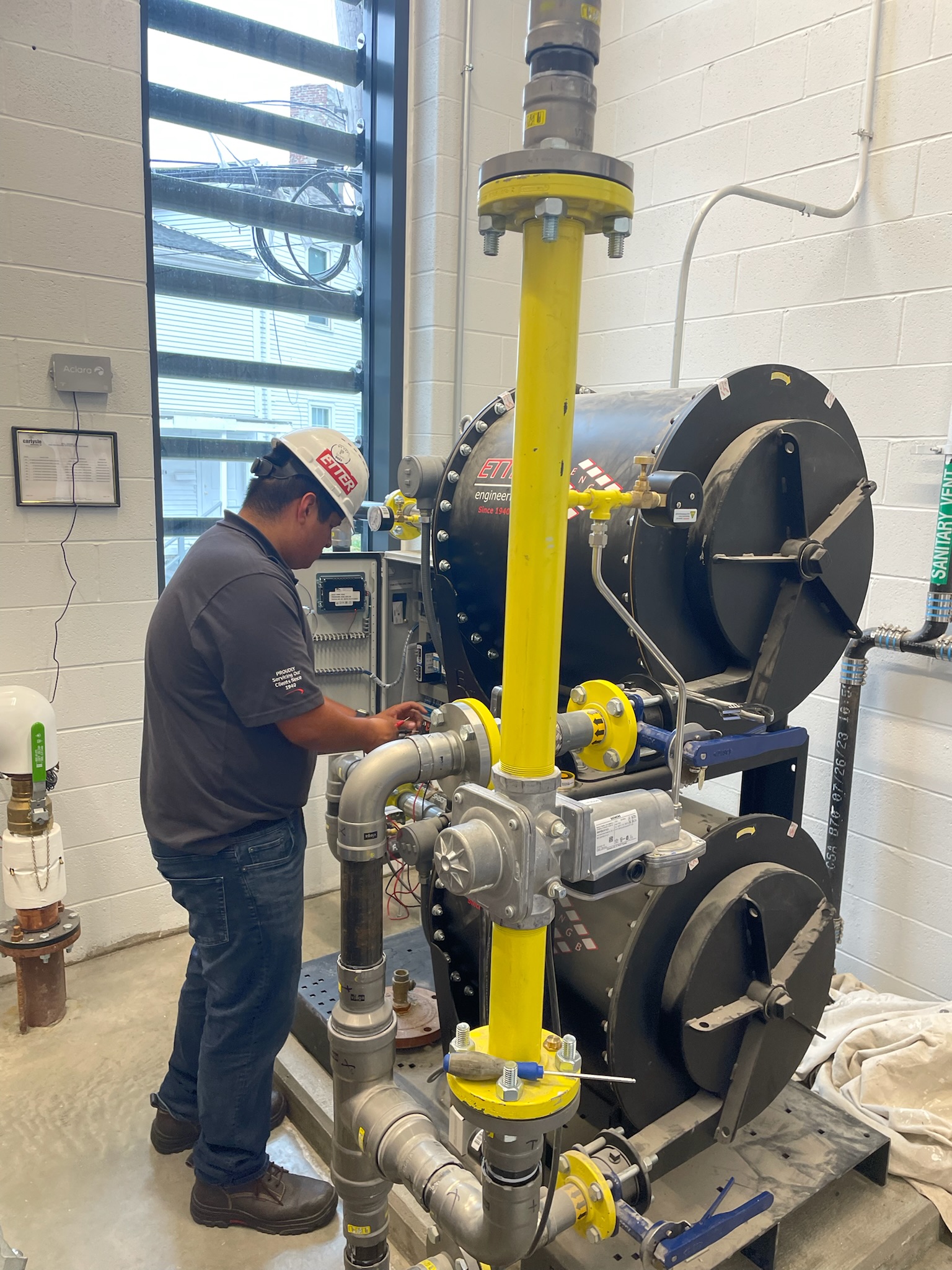 Gabe working on ETTER Booster system