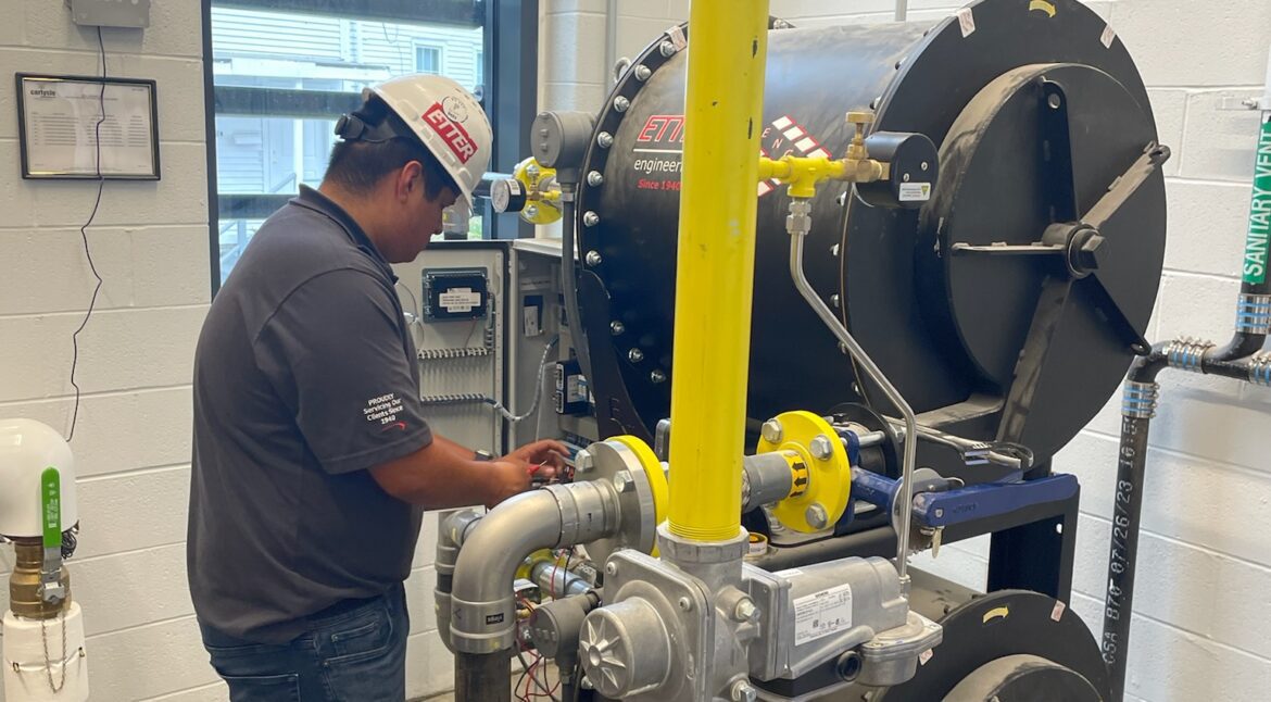 Gabe working on ETTER Booster system